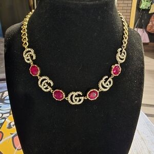 USES...Gucci Gold Necklace with Red Accents And Crystals